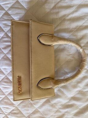 Jacquemus Cream Beige Mini Top-Handle Bag.